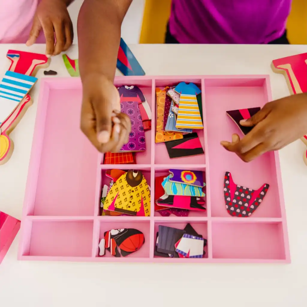 Detailed wooden dolls with rich magnetic accessories.